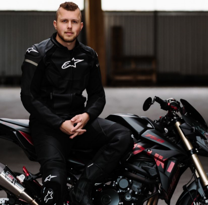 A person sitting on a bike